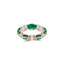 Oval Cut Emerald and Diamond Ring