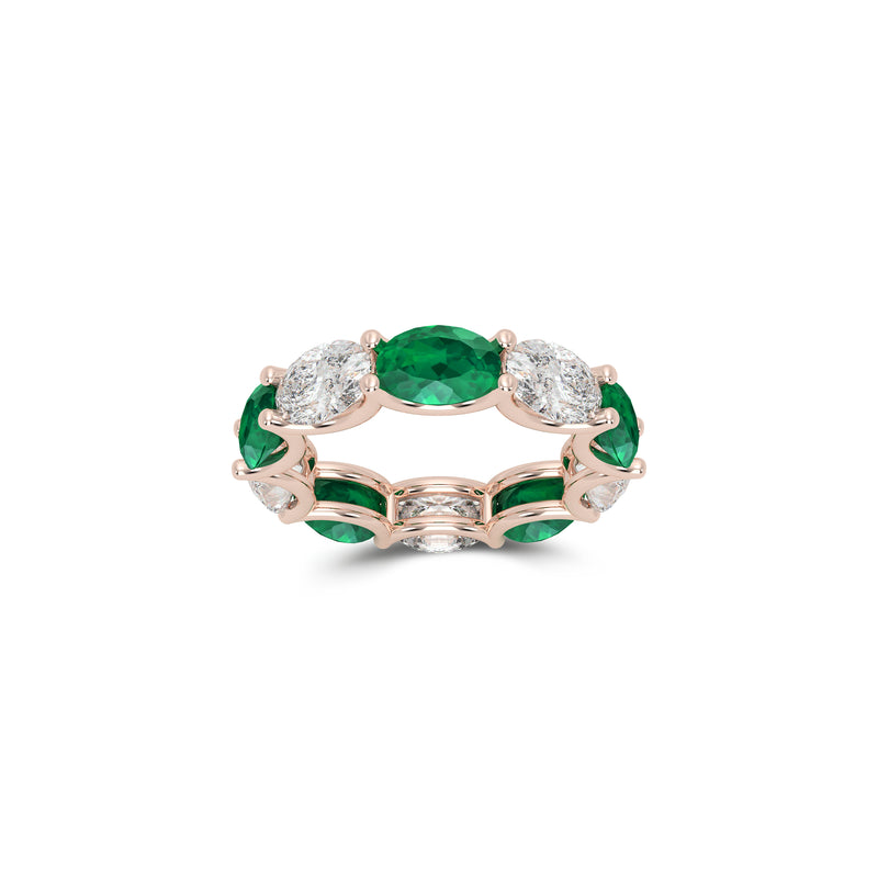 Oval Cut Emerald and Diamond Ring