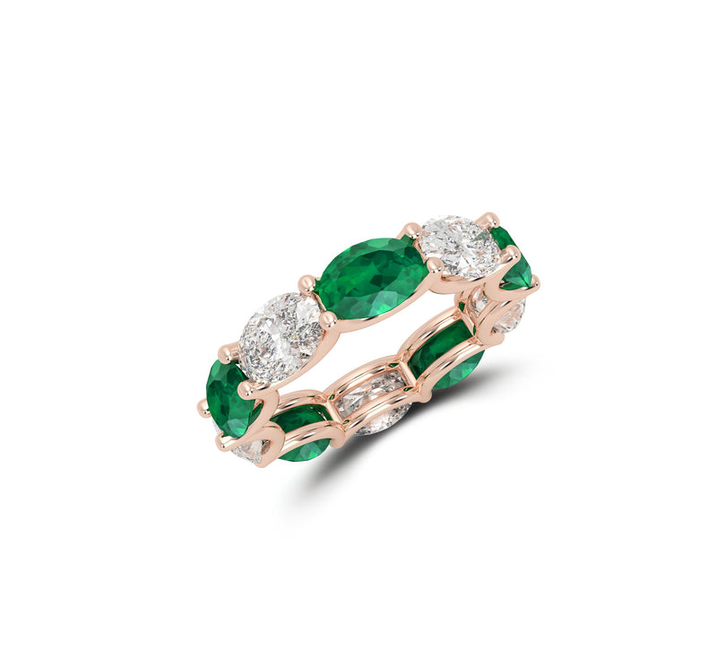 Oval Cut Emerald and Diamond Ring