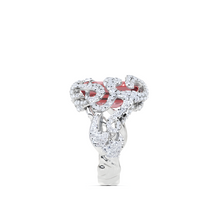 Anillo de alta joyería con diamantes y talla radiante de esmeralda